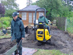 White of Witchampton - landscape gardener - White of Witchampton (WoW Gardens) employees digging a new garden pond.